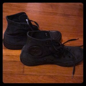 All black Converse All Star high tops